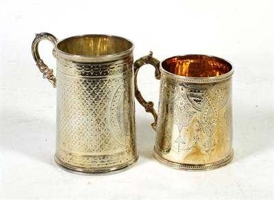 Lot 351 - Two Victorian silver christening mugs, both with engraved decoration, 8.5ozt