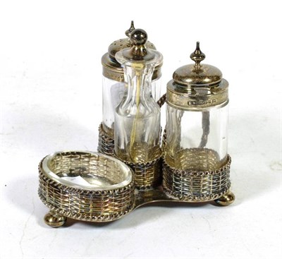 Lot 355 - A Victorian silver cruet stand, Joseph & Thomas Bradbury, Sheffield 1869, with basket weave...