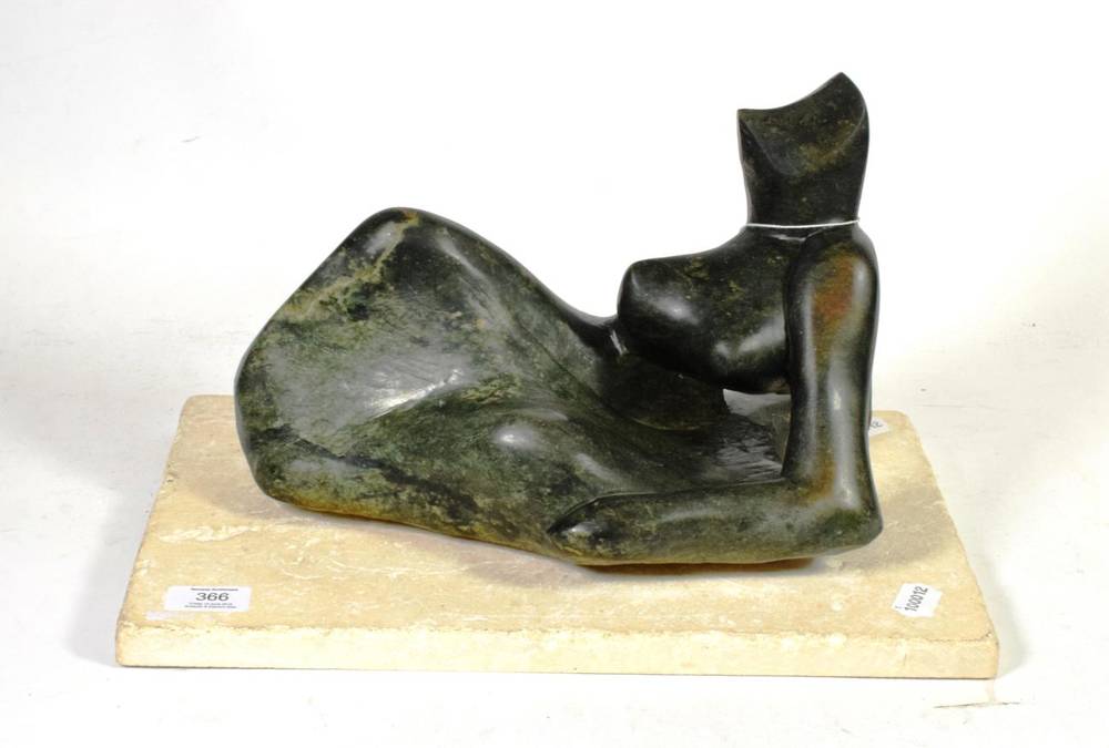 Lot 366 - Janet Hollins (Contemporary) After Henry Moore, female figure, carved opal stone, on limestone...