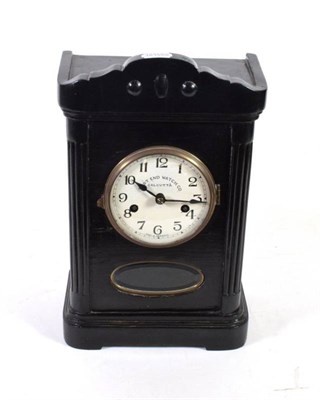 Lot 369 - An ebonised striking mantel clock, dial signed East End Watch Company, Calcutta, twin-barrel...