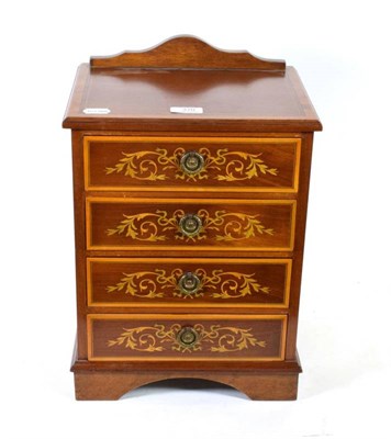 Lot 370 - An inlaid mahogany miniature four height chest of drawers