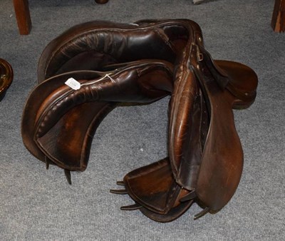Lot 1104 - Two hunting leather saddles