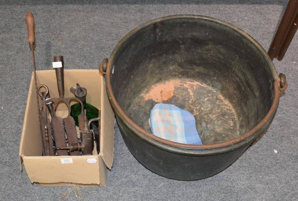 Lot 1112 - A large copper log bin with swing handle; together with a box of metalwares; and a moulded...