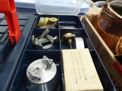 Lot 1117 - A collection of watchmakers tools and clock and watch parts