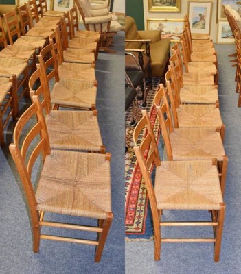 Lot 1130 - Seventeen ropework seated pine ladder back chairs