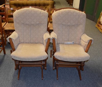 Lot 1131 - Two multi position Dutailier chairs