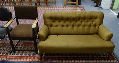 Lot 1132 - Elm framed part upholstered elbow chair, together with a button back sofa