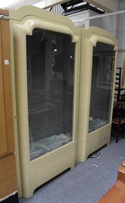 Lot 1140 - A pair of good quality modern display cabinets with glass shelves and interior lighting, each...
