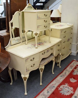 Lot 1144 - A cream and floral painted part bedroom suite comprising pair of single headboards, dressing...