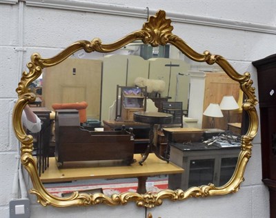 Lot 1155 - Reproduction mirror in the Rococo taste