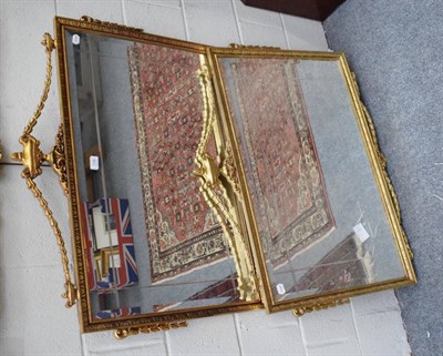 Lot 1156 - Pair of reproduction rectangular gilt framed mirrors, with urn and swag surmounts