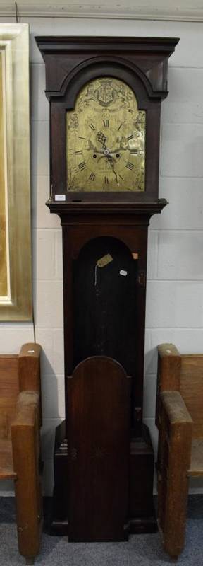 Lot 1167 - ~ A mahogany eight day longcase clock, one piece silvered brass dial with engraved scenes and...