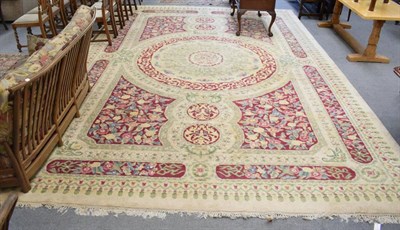 Lot 1182 - Indian Carpet, modern, the compartmentalised field centred by a roundel medallion framed by...