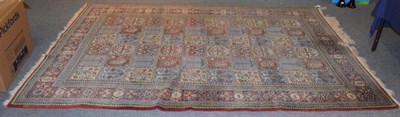 Lot 1188 - Ghom Carpet, Central Iran, circa 1950, the polychrome compartmentalised field of trees birds...