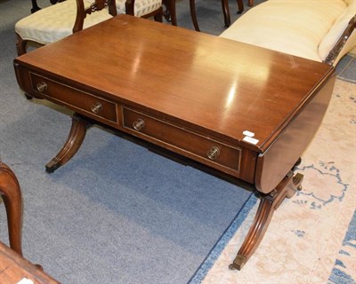 Lot 1194 - A drop end coffee table