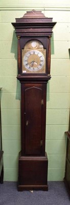 Lot 1200 - ~ An oak thirty hour longcase clock, arch brass dial with silvered disc inscribed W Porthouse,...