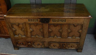 Lot 1203 - A large joined oak chest, inscribed 1722, later adapted with two cupboard doors