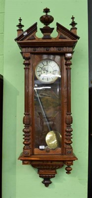 Lot 1206 - A walnut veneered double weight driven Vienna type wall clock, late 19th century