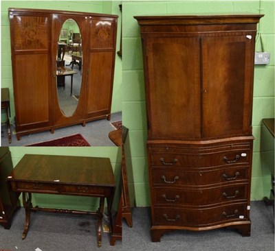 Lot 1207 - An Edwardian mahogany triple wardrobe, a reproduction Regency style sofa table and a...