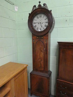 Lot 1208 - ~ A mahogany eight day quarter-striking longcase clock, circular painted dial signed Richard...