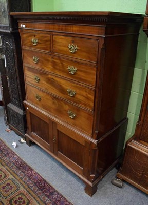 Lot 1212 - George III mahogany chest on stand, the base fitted with a pair of cupboard doors
