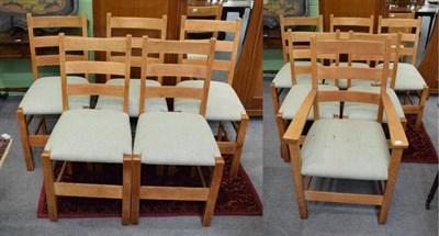 Lot 1217 - Set of eleven Arts & Crafts oak dining chairs, including one carver