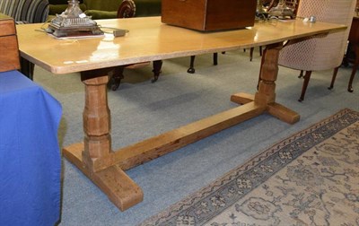 Lot 1240 - English oak trestle table, raised on faceted baluster legs