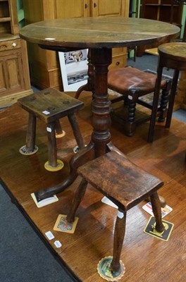 Lot 1274 - Two small oak stools and a tripod occasional table (3)