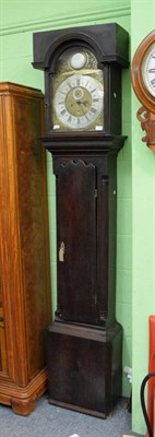 Lot 1287 - ~ A mahogany eight day longcase clock, arch brass dial with silvered disc in the arch signed...