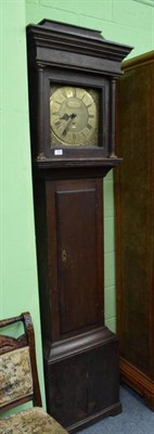 Lot 1289 - ~ An oak thirty hour longcase clock, square brass dial with oval shaped plaque signed John...