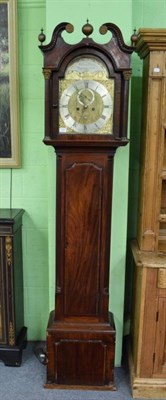 Lot 1296 - A mahogany eight day longcase clock, arch brass dial signed on a silvered recessed plaque...