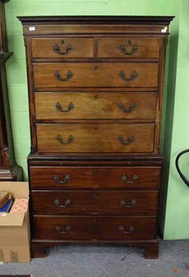 Lot 1300 - A George III mahogany chest on chest, late 18th century with two short over three long drawers, all