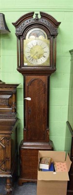 Lot 1301 - ~ An oak and mahogany thirty hour longcase clock, arch brass dial signed Thos Lawson, Keighley,...