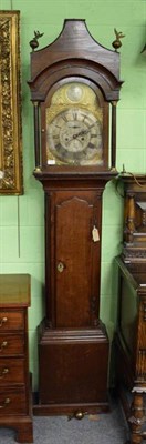 Lot 1303 - ~ An oak eight day longcase clock, arch brass dial with a silvered disc in the arch signed Robt...