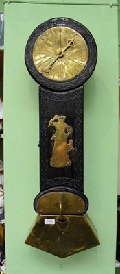 Lot 1306 - ~ An oak carved case water clock