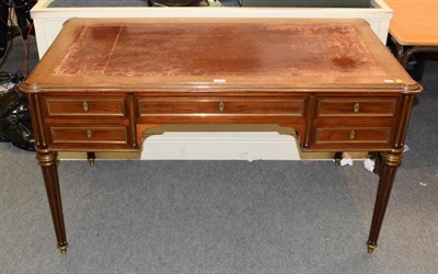 Lot 1309 - A late 19th century French Louis XVI transitional style writing desk, 136cm by 77cm by 77cm