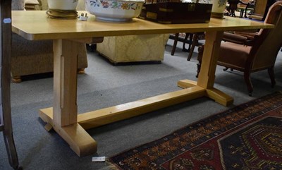 Lot 1311 - English oak trestle table, raised on chamfered block legs