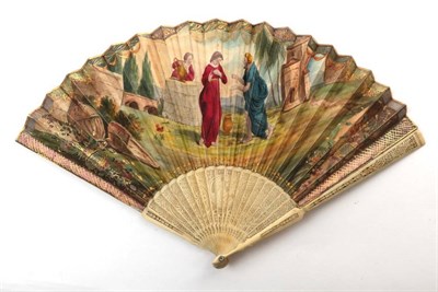 Lot 2016 - An Early 18th Century Ivory Fan, circa 1730, depicting Rebecca and Eliezer at the well, Rebecca...