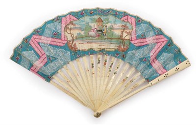 Lot 2023 - An Early 18th Century Ivory Fan with double paper leaf, the monture relatively plain, the...
