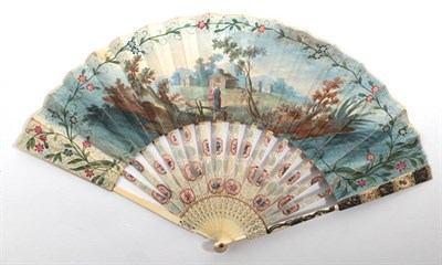 Lot 2026 - A Mid-18th Century Ivory Fan, the monture carved and pierced, silvered and gilded. The guards...
