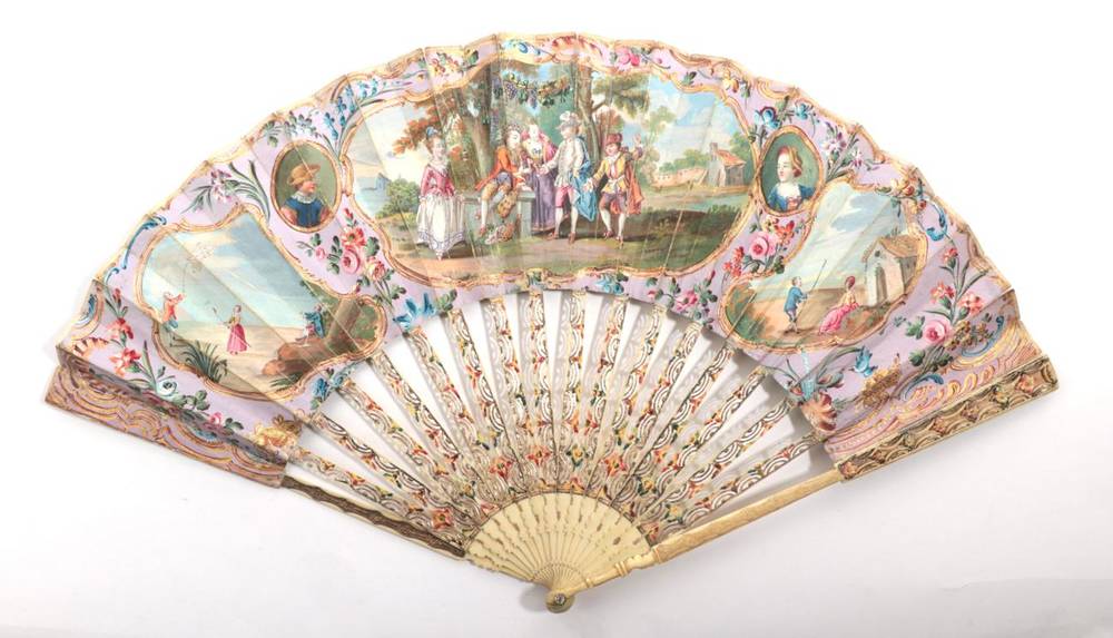 Lot 2031 - The Engagement: A Late 18th Century Ivory Fan, the slender monture carved and pierced and...