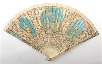 Lot 2035 - Homage to Cupid: A Circa 1790 English Brisé Fan, ivory, carved pierced, gilded in three shades and