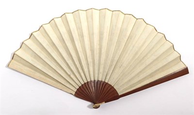 Lot 2100 - A Slender Wooden Fan, with ivory thumb guards dating from the late 18th or early 19th century,...