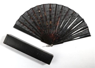 Lot 2122 - A Small and Elegant Early 20th Century Tortoiseshell Fan, the single black gauze leaf...