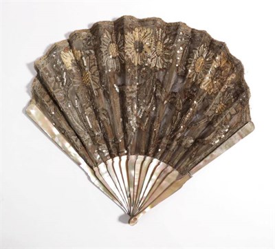 Lot 2129 - A Circa 1900 Mother-of-Pearl Fan, of an unusual taupe shade, the gorge sticks gently shaped at...