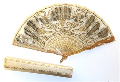 Lot 2131 - A Circa 1905 Spangled Horn Fan, the monture carved and shaped with an almost serpentine/rope effect