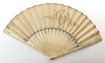 Lot 2134 - A 19th Century Fan, the leaf mounted on well carved, gilded and delicately painted ivory...