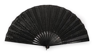 Lot 2141 - A Striking Large Circa 1890's Wooden Fan, the monture lightly carved and clouté with steel....