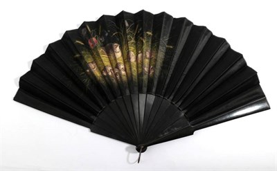 Lot 2144 - A Large Circa 1890's Black Wooden Fan, mounted with a black silk satin leaf finely painted with...