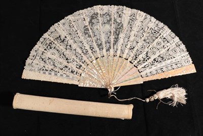 Lot 2152 - A Large Mixed Brussels Lace Fan, circa 1880's, the bobbin lace leaf with large central detail...